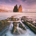 Coastline with sea stacks in sunset time with red and purple light. Rialto Beach in Olympic National Park, Olympic Peninsula, USA. Royalty Free Stock Photo