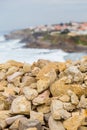 Coastline with stones and surfs in cloudy day Royalty Free Stock Photo