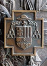 The coat of arms of Bishop Marko Culej, detail of the entrance door of cathedral of Assumption in Varazdin, Croatia