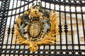 Coat of arms on Buckingham Palace fence Royalty Free Stock Photo