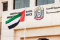 Coat of arms and flag at the Ministry of Finance of the United Arab Emirates in Dubai, which is part