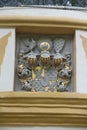 The coat of arms that is a fragment of the facade of the chapel in Kalwaria Wejherowska