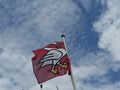 Coat of arms of Horgen as a flag on the mast of the ferry boat sailing from Horgen to Meilen Royalty Free Stock Photo