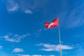 Coat of arms of Lithuania. A rider with a sword on a horse on a red background. Historical flag of Lithuania against the Royalty Free Stock Photo