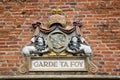 Coat of arms with motto meaning Keep the Faith, at Magdalene College, Cambridge University,