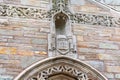 Coat of arms of Yale University on historic building facade. Hebrew words Urim and Thummim - Lights and Perfections. Latin words