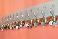 Coat hooks with labels organized in a row