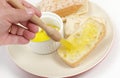 Coating ciabatta with garlic oil Royalty Free Stock Photo