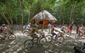 Visitors explore Coba ruins by bicycle Royalty Free Stock Photo