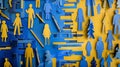 cobalt blue and yellow paper people cutouts