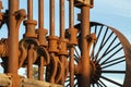 Close-up of rods in old stamper battery against a blue sky Royalty Free Stock Photo