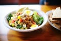 cobb salad with a side of multigrain bread