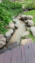 cobbled path in a beautiful green garden Royalty Free Stock Photo