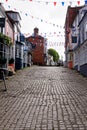 Cobbled Quay Hill shops in Lymington - Hampshire UK Royalty Free Stock Photo