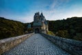 Cobbled road to medieval Burg Eltz castle at twilight, Rhineland-Palatinate, Germany