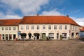 Cobbled square Torvet with shops in old town of Mariager, Nordjylland, Denmark