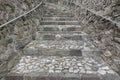 Old cobbled staircase between two stone walls Fiera di Primiero, Pale di San Martino Royalty Free Stock Photo