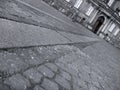 Cobbled stone natural material path, paving, road or pedestrian walkway, local abstract work, old town in European country, Royalty Free Stock Photo