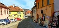 Cobbled street and souvenir shop in Sighisoara, Romania
