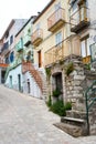 Cobbled street with townhouses in an old town