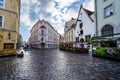 Cobbled streets after raining and reflections on the ground. Tallinn Estonia. Royalty Free Stock Photo