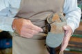 Cobbler mending sole shoe