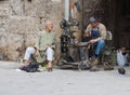 Cobbler outside Aleppo Citadel, Syria Royalty Free Stock Photo