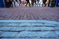 Cobblestone and brick street on Freedom Trail Boston with pedestrians Royalty Free Stock Photo