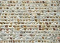 Cobblestone building wall detail on historic house Royalty Free Stock Photo