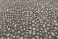 Cobblestone design with sand