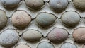 Cobblestone like appearance with small gaps of concrete visible Royalty Free Stock Photo