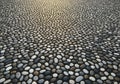 Cobblestone pavement featuring a pattern of small, smooth Royalty Free Stock Photo