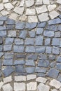 cobblestone pavement of old town texture background. Top view of stone road. Detail granite sidewalk Royalty Free Stock Photo