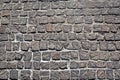 Cobblestone pavement texture background. Top view of stone road. Detail of granite sidewalk taken from above. Old street Royalty Free Stock Photo