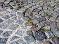 Cobblestone pavers arranged in arch pattern