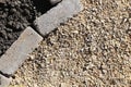 Cobblestone Pavers Edging Gravel and Garden Soil