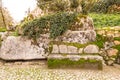 Cobblestone road to the palace foam among the rocks and trees an Royalty Free Stock Photo