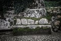 Cobblestone road to the palace foam among the rocks and trees an Royalty Free Stock Photo