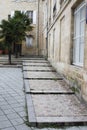 Cobblestone stairway on the square Palais Gallien in bordeaux city France