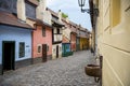 Cobblestone street and colorful 16th century cottages of artisans known as Golden Lane inside the castle walls Prague Czech Re Royalty Free Stock Photo