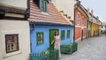 Cobblestone street and colorful 16th century cottages of artisans known as Golden Lane inside the castle walls Prague Czech Royalty Free Stock Photo