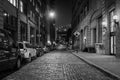 Cobblestone street at night in DUMBO, Brooklyn, New York City Royalty Free Stock Photo