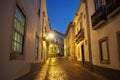 Cobblestone street in the old town, night view, Faro, Portugal Royalty Free Stock Photo