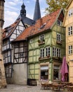 Cobblestone street in Quedlinburg with historical buildings