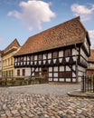 Cobblestone street in Quedlinburg with historical buildings