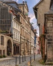 Cobblestone street in Quedlinburg lined with historical buildings