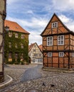 Cobblestone street in Quedlinburg lined with historical buildings