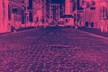 Cobblestone street view in the SoHo of Manhattan in New York City in pink and blue Royalty Free Stock Photo