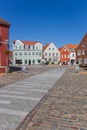 Cobblestones and colorful houses at the Torvet square in Tonder