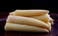 Cobs of juicy young corn. Pickled corn. Delicious baby corn Royalty Free Stock Photo